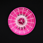 Top-down close-up of a circular filter cotton retainer secured on a pink high-efficiency filter