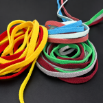 Detailed view of multi-color seersucker earloops for fashion and protective masks